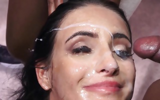 Barbie Esm earns her face wrapped up in cum shots fulfilled far and near